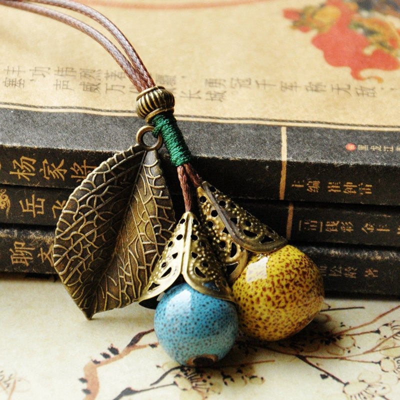 Leaf and Berries Ceramic Pendant Long Leather Rope Chain Ceramic Ball Pendant Vintage Sweater Necklace for Women Clothing Jewelry Accessories Gift - I Love Heartstrings