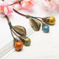 Leaf and Berries Ceramic Pendant Long Leather Rope Chain Ceramic Ball Pendant Vintage Sweater Necklace for Women Clothing Jewelry Accessories Gift - I Love Heartstrings