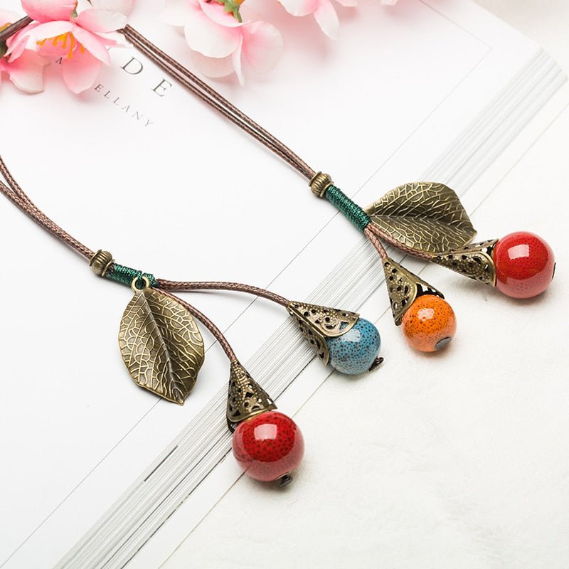 Leaf and Berries Ceramic Pendant Long Leather Rope Chain Ceramic Ball Pendant Vintage Sweater Necklace for Women Clothing Jewelry Accessories Gift - I Love Heartstrings